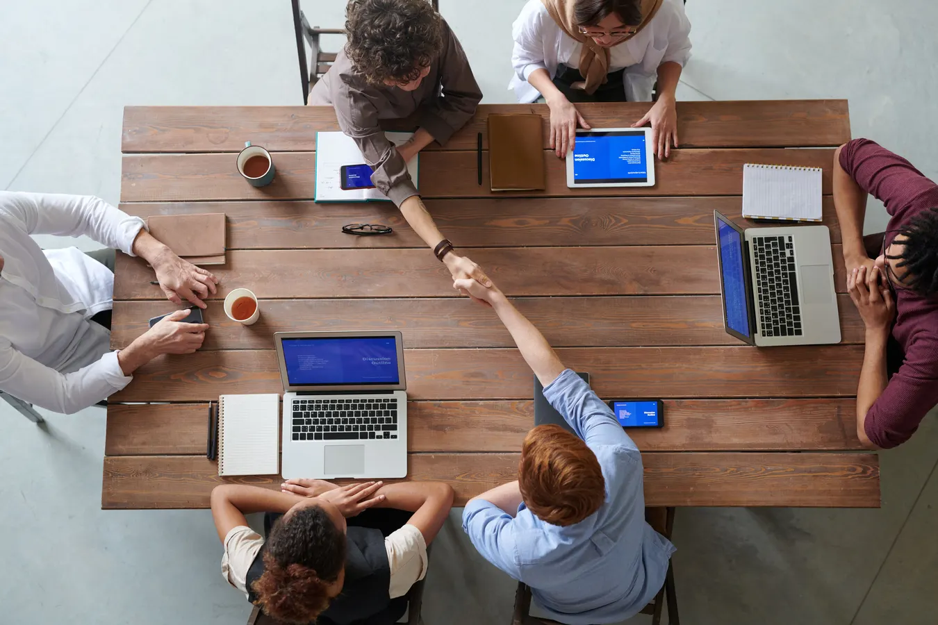 Small business owner reviewing new customer leads and marketing analytics on a laptop