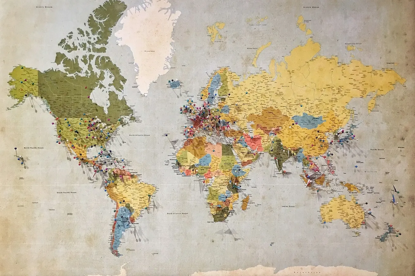World map marked with colorful location pins